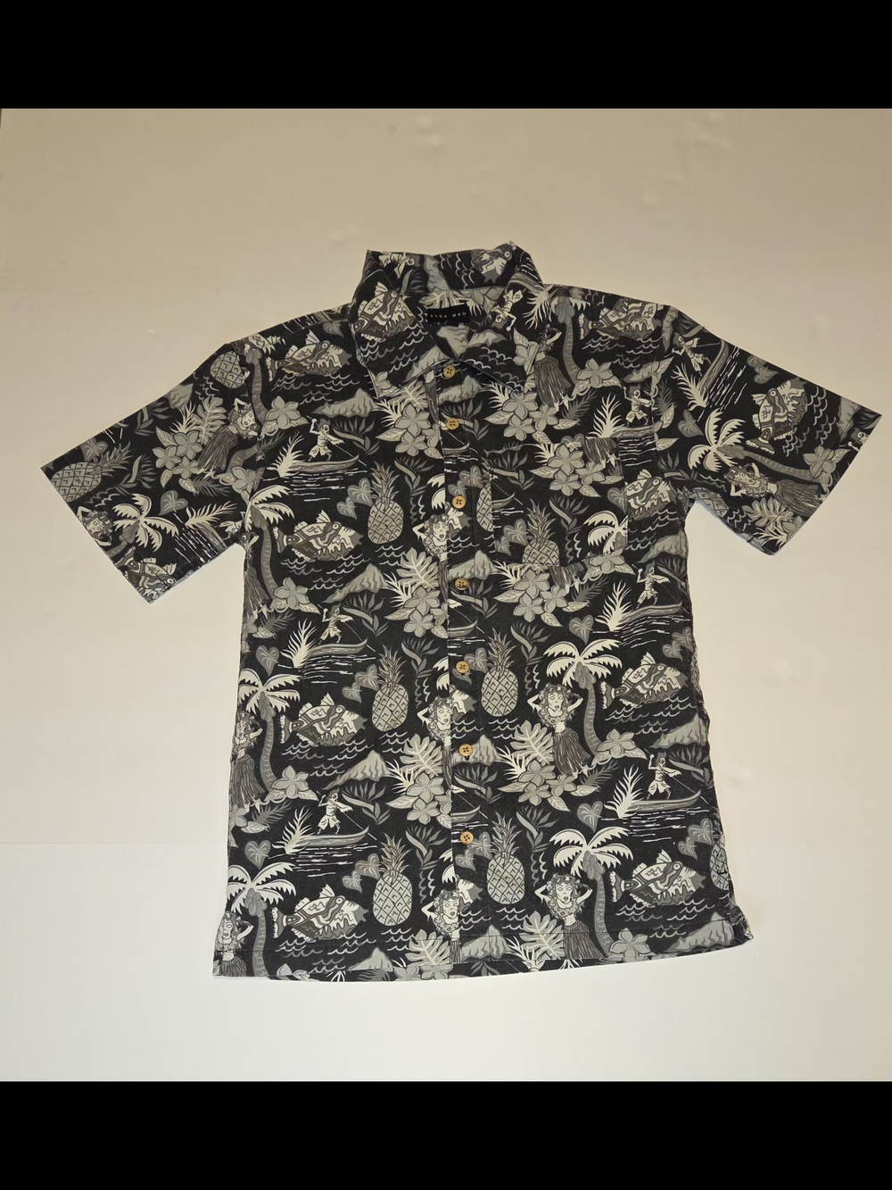Saga Man Island Themed Gray Scale Cartoon Button Down